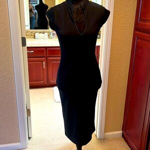 Classic Diane Von Furstenberg black wool dress Size 2 form fitting but comfy